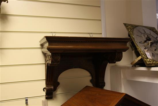 An Edwardian walnut chiming bracket clock, overall height 38in.